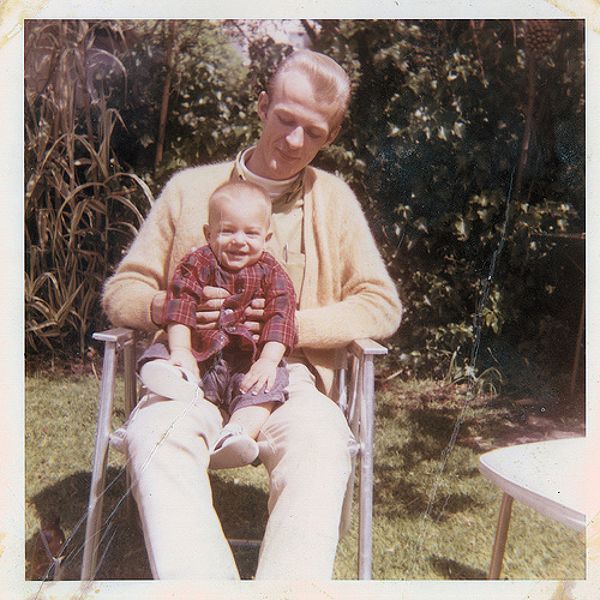 Vintage father and son celebrating achievements